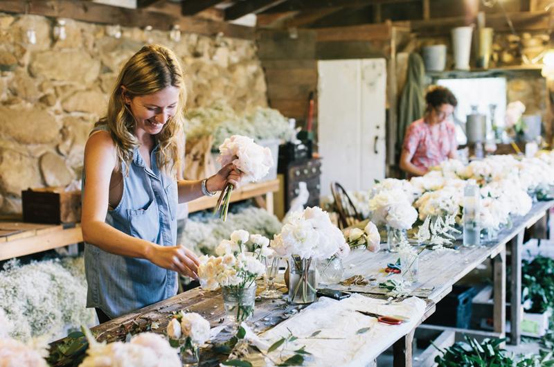 Sara Elbert of Tea Lane Farm prepares floral arrangements.