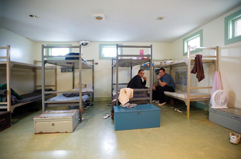 Brett Geddis, left, and Richard Brymer are in a dormitory-style room in the newer section of the jail, which houses about a thousand inmates a year.