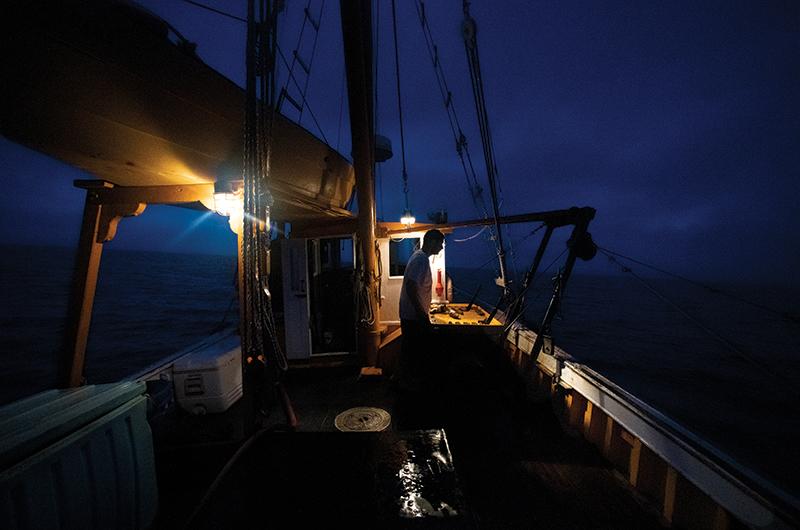 Jason Jr. is up before dawn in search of fluke.
