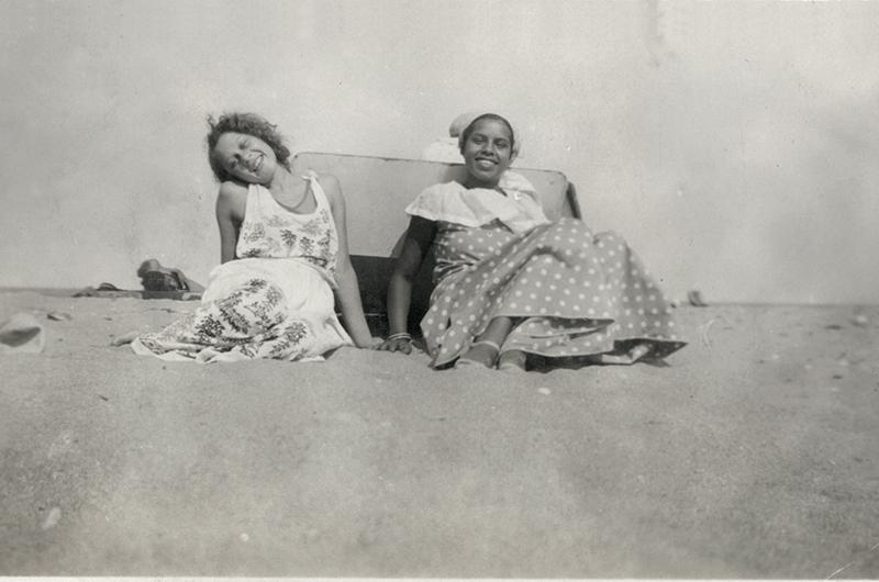 Doris and her sister Liz relax at the beach during the 1930s.