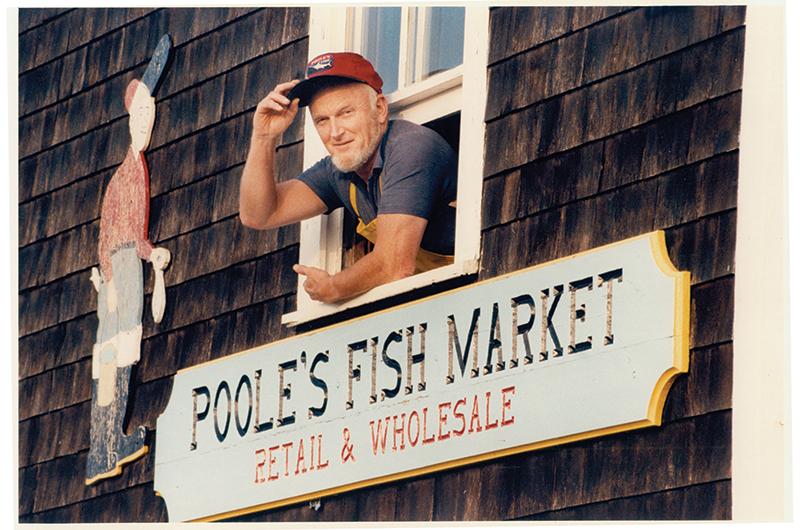 Everett Poole, one of the original commissioners, seen here at his Menemsha fish market in the 1970s.