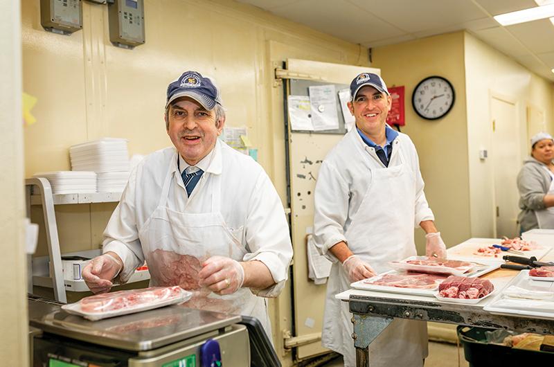 Robert “Bob” Pacheco and son, Eddie, in the meat department.