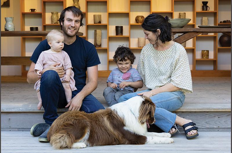Micah Thanhauser and his wife, Emily, moved into their combined home and studio space in 2018. Since then they’ve had two children, Mae (left) and Asa (right), and adopted an Australian shepherd named Fergus.