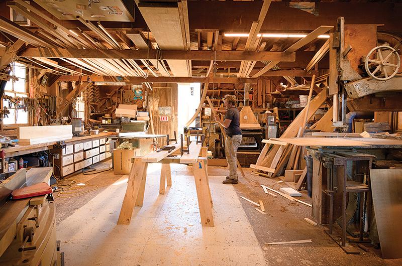 Lyle repurposes teak boards originally used as bunk flats into a new foredeck scuttle hatch.
