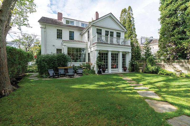 The east-facing side of the home gives passersby a glimpse into the historic residence.