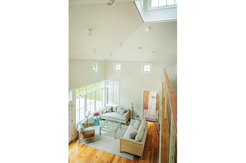 The restored cupola at the top of the loft allows natural light to shine into the space.