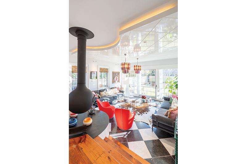 The living room’s open-concept layout is reminiscent of an art gallery.