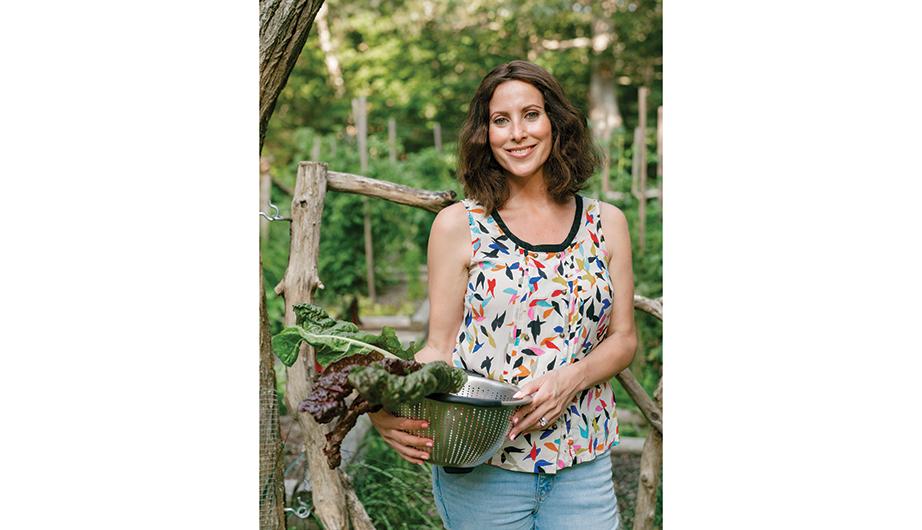 Cookbook author Julia Blanter in her vegetable patch at home in West Tisbury.