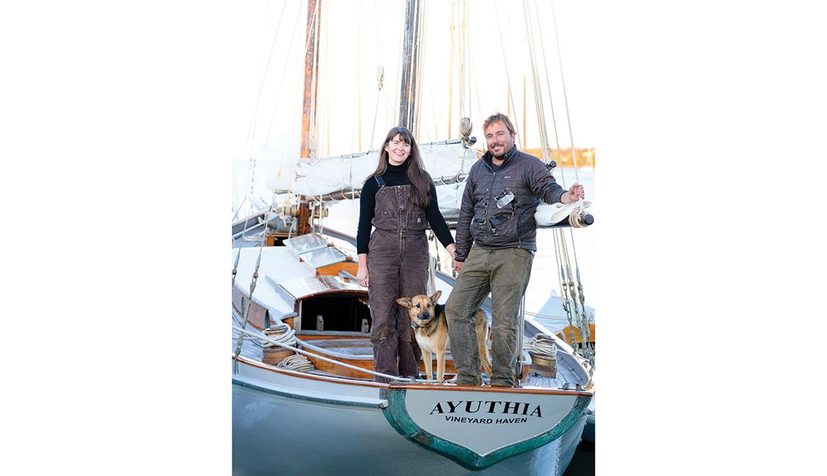 Abbie and Lyle Zell, with their dog, Starling, aboard their ketch, Ayuthia.