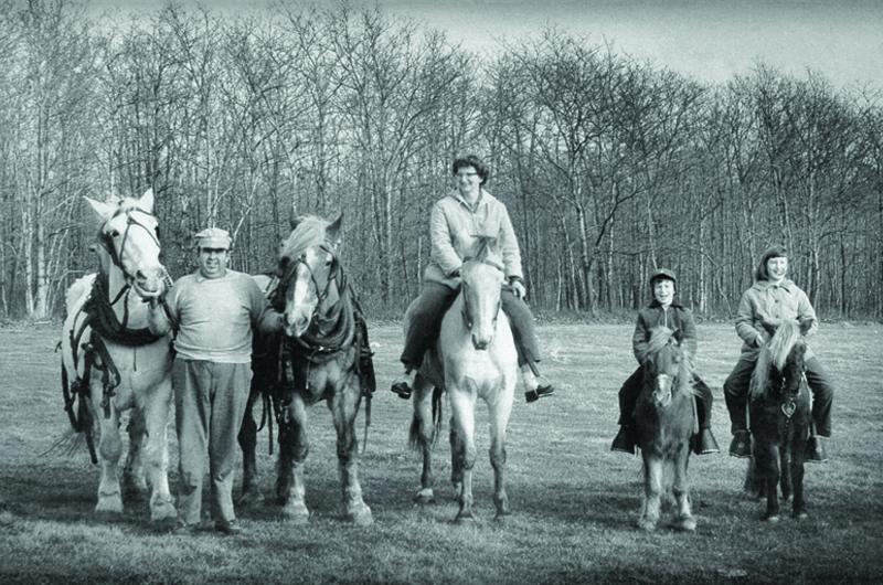 Fred Fisher Sr., Muriel Fisher, Fred Fisher Jr. (Freddy), and Sandra Fisher on the farm in the early 1960s.